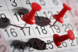 Important date or meeting appointment reminder concept thumbtack on calendar
